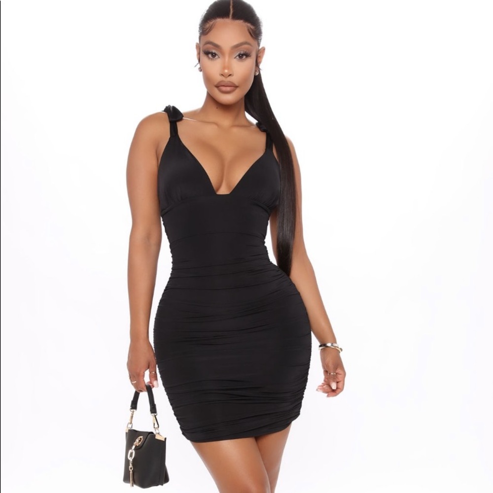 BRAND NEW: NEVER WORN, black ruched sexy dress